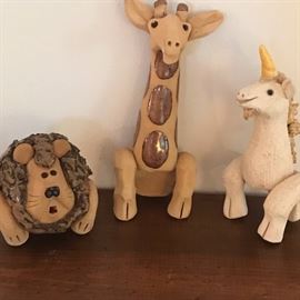 Whimsical fired painted clay animals! Designed to hang on your flower pots!
