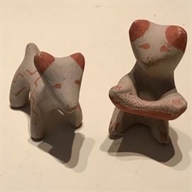 Pair of small whimsical fired painted clay animals.