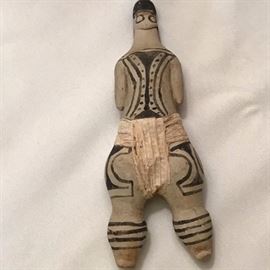 Fired clay female figure.