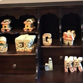 Whimsical collection of miniature letters: The A is an apple core, the J is two jars, etc.