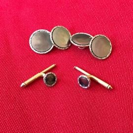 Antique sterling and mother of pearl cufflinks and studs.