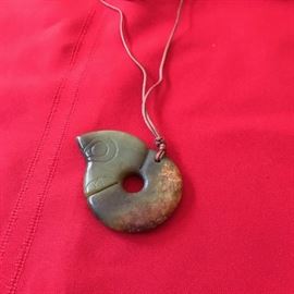 Hardstone carved pendant. Feels like jade.