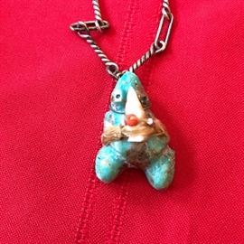 A Zuni Fetish creation, sterling chain, turquoise and other stones.
