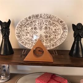 Antique English transferware platter, large Mexican fired pottery angel candlesticks and a funky 60's wooden clock.