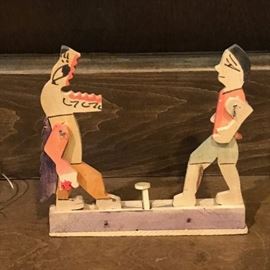 Neat Asian wooden action toys. Press the middle button and they fight!
