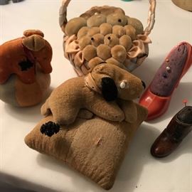 Part of this amazing collection of sewing instruments: Antique and vintage cushions.