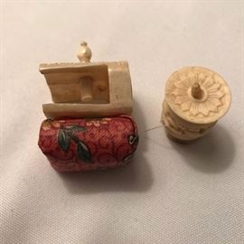 Bone? small "3rd hand" and a sewing kit.