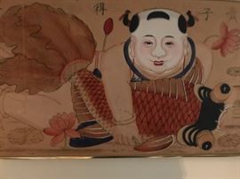 Large oriental artwork on the second floor landing.