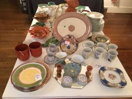 Lots of different china and serving pieces.