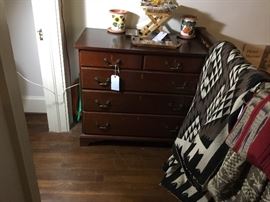 Vintage chest and rugs.
