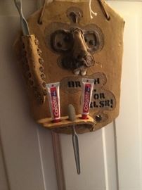Whimsical toothbrush holder.