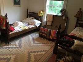 Antique twin beds and runs.