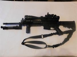 AR-15 5.56 Rugar 223 Cal. Quad Rail, Armed Forces Green laser, Tripod w/adj. legs, 6-24x50 AOEG Bushnell Scope, Waterproof, fog, Shockproof, Red and green illuminated graphic sight. Red /Green dot scope mounted on Bushnell scope, Bungee Sling.  NEVER FIRED All NEW With Box. 