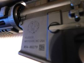 AR-15 5.56 Rugar 223 Cal. Quad Rail, Armed Forces Green laser, Tripod w/adj. legs, 6-24x50 AOEG Bushnell Scope, Waterproof, fog, Shockproof, Red and green illuminated graphic sight. Red /Green dot scope mounted on Bushnell scope, Bungee Sling.  NEVER FIRED All NEW With Box. 