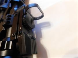 AR-15 5.56 Rugar 223 Cal. Quad Rail, Armed Forces Green laser, Tripod w/adj. legs, 6-24x50 AOEG Bushnell Scope, Waterproof, fog, Shockproof, Red and green illuminated graphic sight. Red /Green dot scope mounted on Bushnell scope, Bungee Sling.  NEVER FIRED All NEW With Box. 