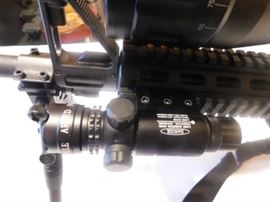 AR-15 5.56 Rugar 223 Cal. Quad Rail, Armed Forces Green laser, Tripod w/adj. legs, 6-24x50 AOEG Bushnell Scope, Waterproof, fog, Shockproof, Red and green illuminated graphic sight. Red /Green dot scope mounted on Bushnell scope, Bungee Sling.  NEVER FIRED All NEW With Box. 