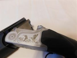 Escort 12 gauge, Over and under Nichol Receiver, Vent Rib Barrel, Poly Stock adj, Cheek Stock, Engraved, Elluminate site, 18 1/2 " Barrel 2 3/4 / 3 " Chambered, NEVER SHOT New in Box 
