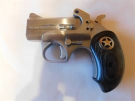 Bonded Arms Derringer 357mg/ 38 special. 410ga. /45 cal extra barrel. Made in Grandberry, TX  Black ash/Texas Star Grips. This firearm is capable of  changing out to 15 different calibers 