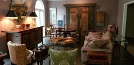 300 year old Chinese Rice Bin Sideboard, English Loo Table, Chipendale side chairs, Ming Dynasty Doors, Couch and Occasional chairs.