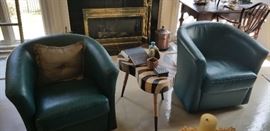 Fine quality leather swivel chairs.  Outstanding coffee table.