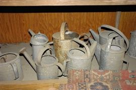 Vintage metal watering cans