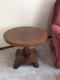 Solid wood table with claw feet
