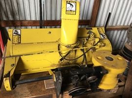 Snow blower for John Deere 300 series lawn tractor, extra wheel weights and tire chains. Add this along with the John Deere cab to the 318 and you are all set for winter and summer.