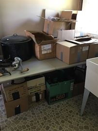 Canning supplies: Large covered pan and lots of small, medium and large jars