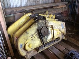 Mower decks for 300 series John Deere lawn tractors (models 300, 317, and 318).