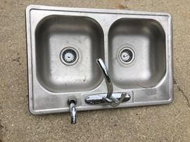 22 x 33 stainless steel sink with Delta faucet
