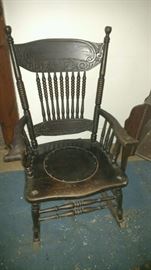 Beautiful antique rocking chairs with leather bottoms