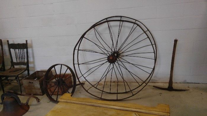 Antique wagon wheels more goodies have been found in this building is full