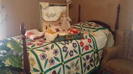 Matching antique twin beds with brand new mattresses still in plastic