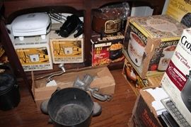 TONS of kitchen appliances still in the boxes!