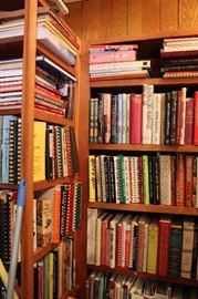 Cookbooks for ages! This picture is inside. High quality books in here including Louisiana cooking & Emeril!