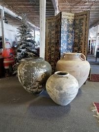 Very large ceramic pots, from Thailand. Tallest is 3.5 ft tall! We have 9 in total for sale, most are in shipping crates.