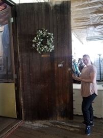 Some fixtures are available for purchase, including this great door! (helpful employee included for scale)