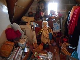 Behind everything..Maple Has Nautical on Head Board, Curtain Rods in Boxes, Angels. Clothes..