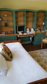 Trundle bed. Three part bookcase wall unit. painted dark green