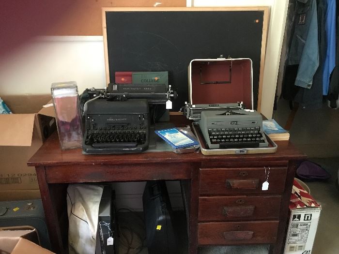 Vintage typewriters and old school  desk