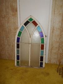 Ornate antique stained glass window