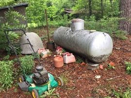 Propane tank.  2 mowers that do not work.  Sold for parts. 