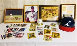 Baseball memorabilia focusing on Atlanta Braves 1989-1993.  Many autographed cards and pix