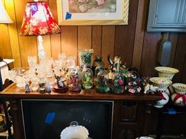 Cut glass, crystal, lots of bird figurines.  Some Lefton