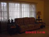 2 leather top end tables; sofa from Belgium