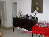 Lincoln Print, buffet, glassware, lamps.