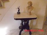 brass figurine; marble top parlor table; bust