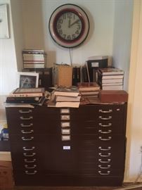vintage neon clock , art deco file cabinet, art books