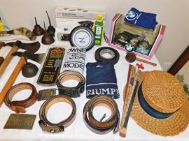 Ford belt buckles and leather belts. Ford gasoline measure. Ford oil cans.