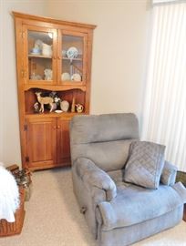 This is the recliner that matches the sofa and love seat in the living room. Very nice vintage corner cupboard.
